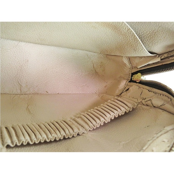 Louis Vuitton Monogram Toiletry Bag in Brown and Gold - Picture 15 of 16